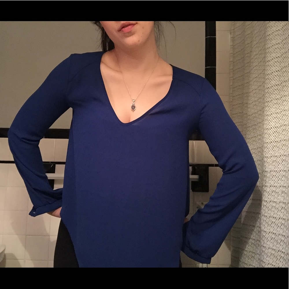 Sheer, dark blue, long sleeve blouse by Lush.